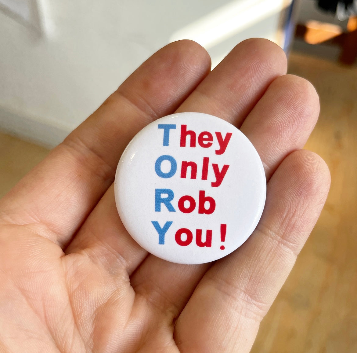 COMMUNITY CHEST BADGE